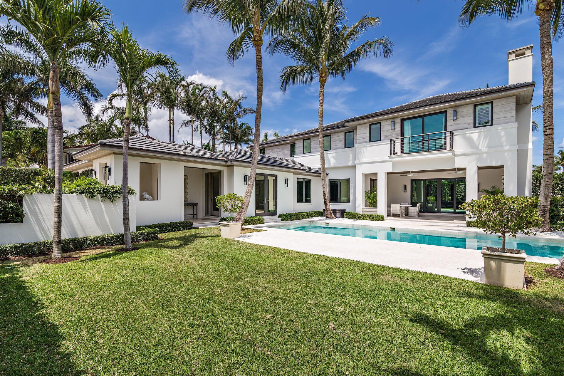 325 Garden Road Palm Beach, FL 33480 - Photo 40 of 57 front view of a house with a yard