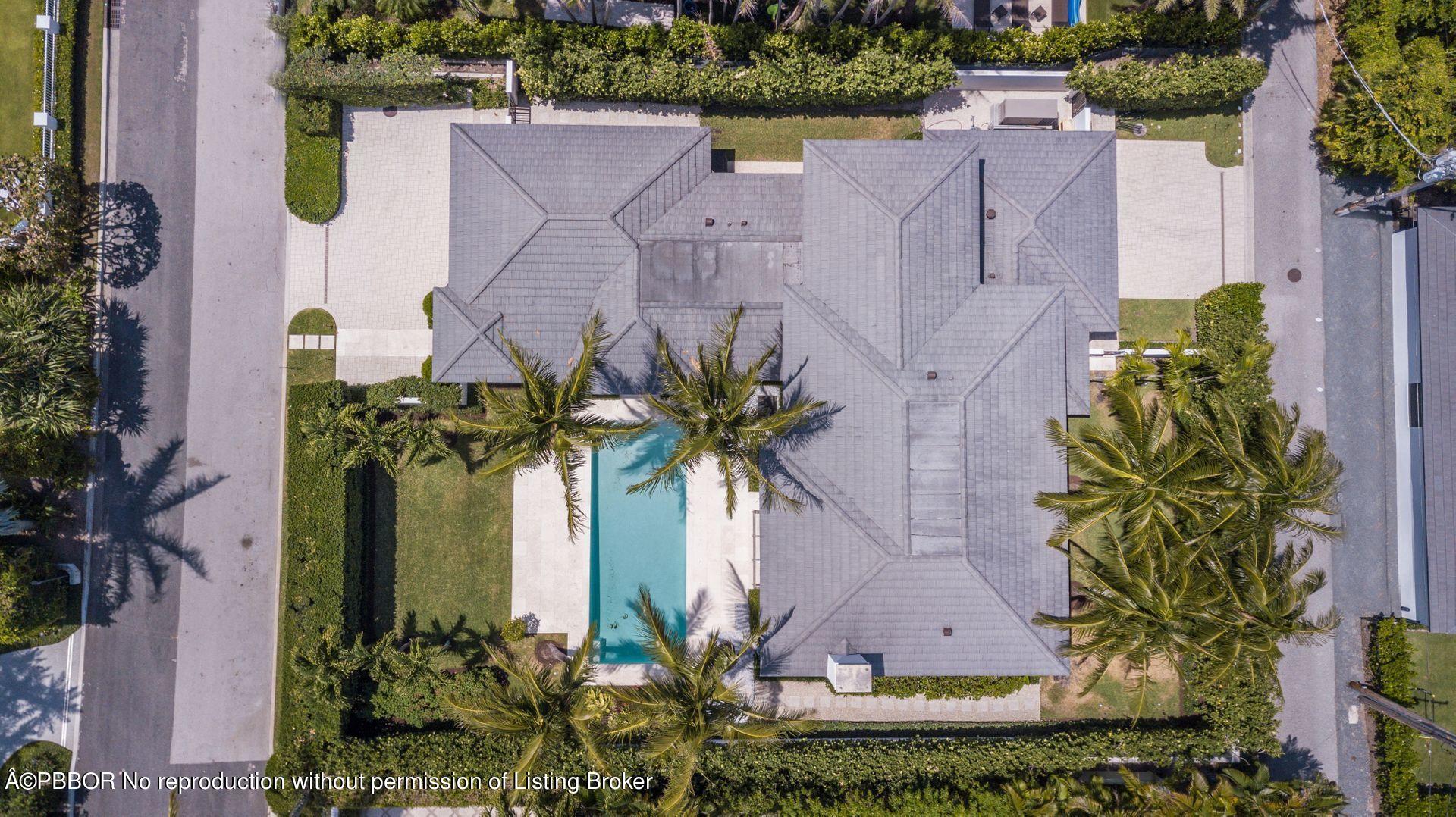 325 Garden Road Palm Beach, FL 33480 - Photo 51 of 57 an aerial view of a house with a yard and a fountain