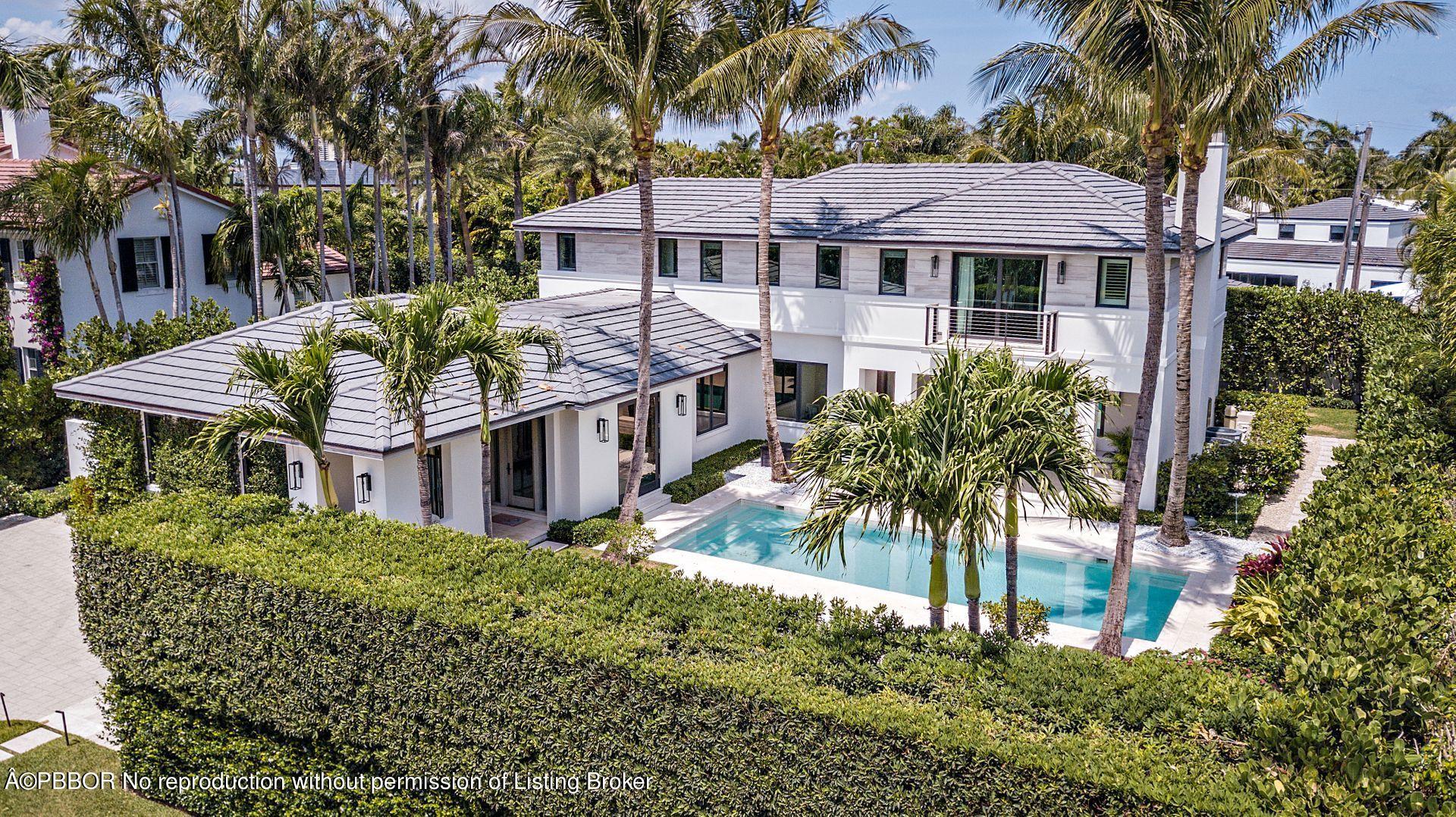 325 Garden Road Palm Beach, FL 33480 - Photo 57 of 57 front view of a house with a garden
