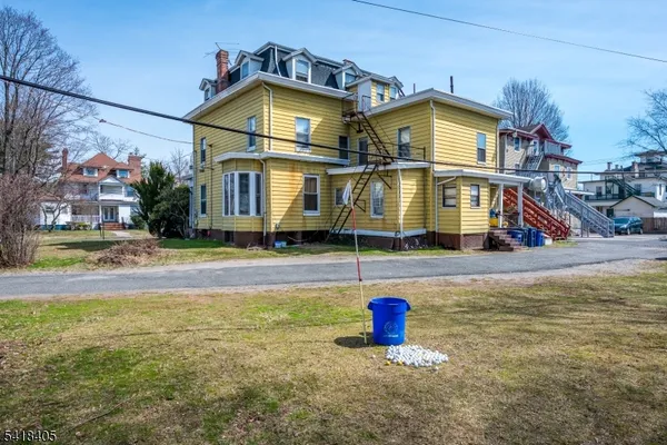 a view of a house with a swimming pool