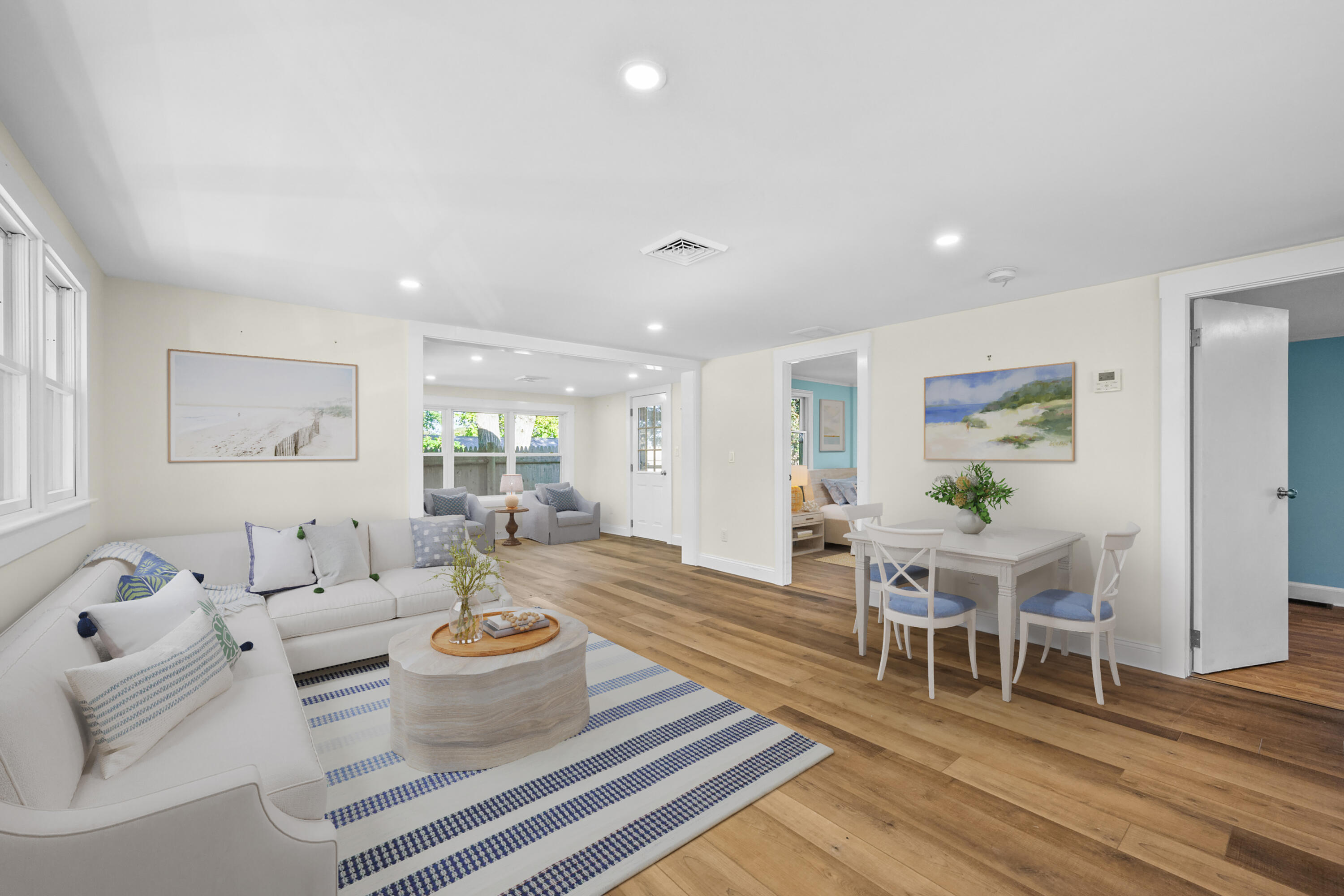 14 Brewster Road West Yarmouth, MA 02673 - Photo 3 of 17 a living room with furniture and wooden floor