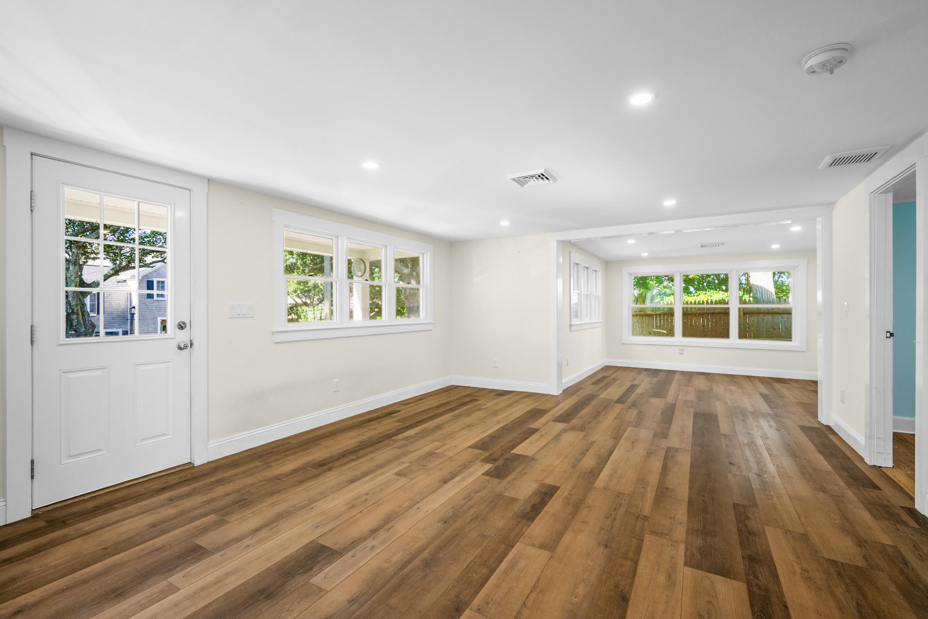14 Brewster Road West Yarmouth, MA 02673 - Photo 4 of 17 a view of empty room with wooden floor and fan