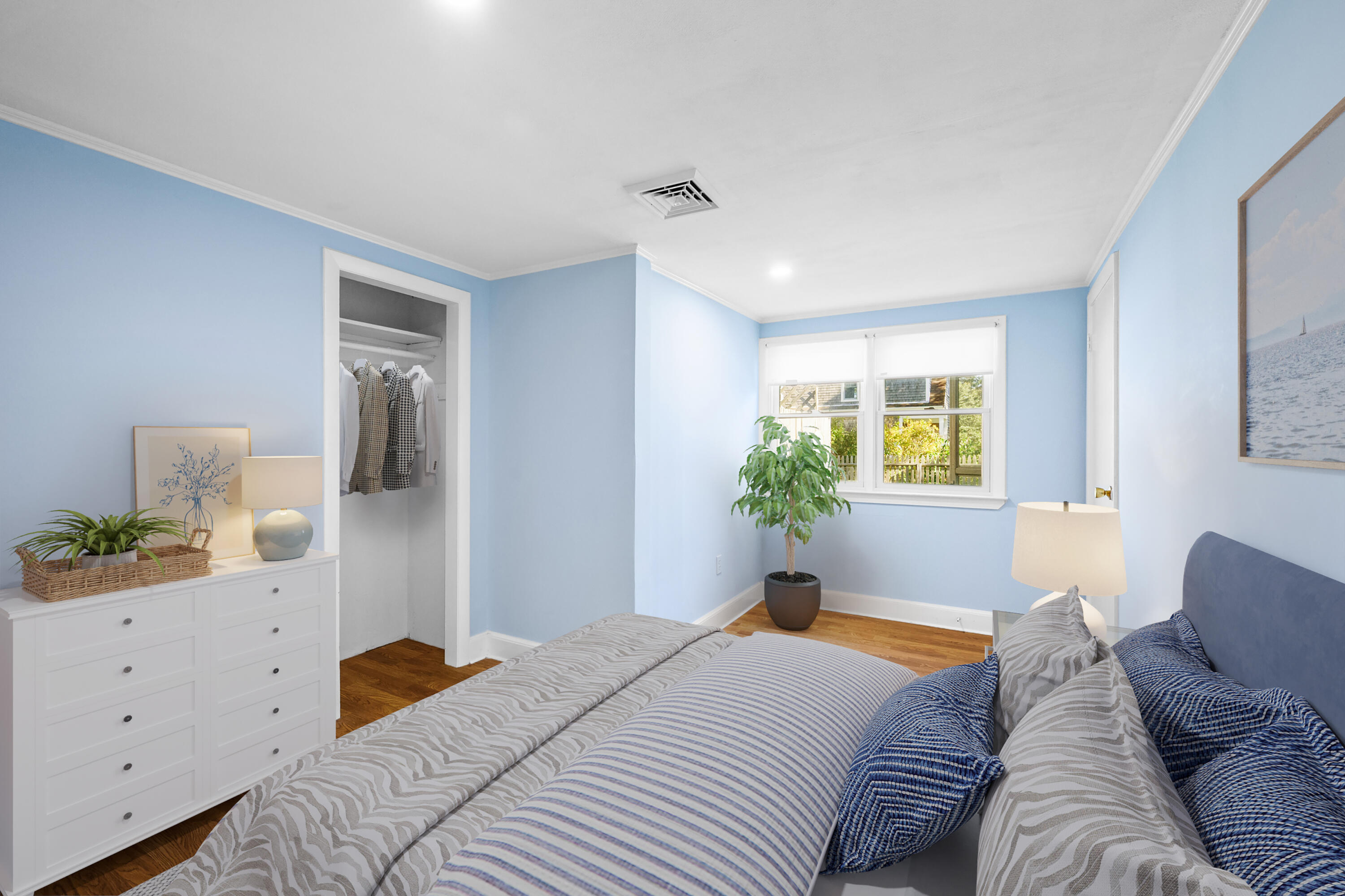 14 Brewster Road West Yarmouth, MA 02673 - Photo 8 of 17 a bedroom with a bed and a window