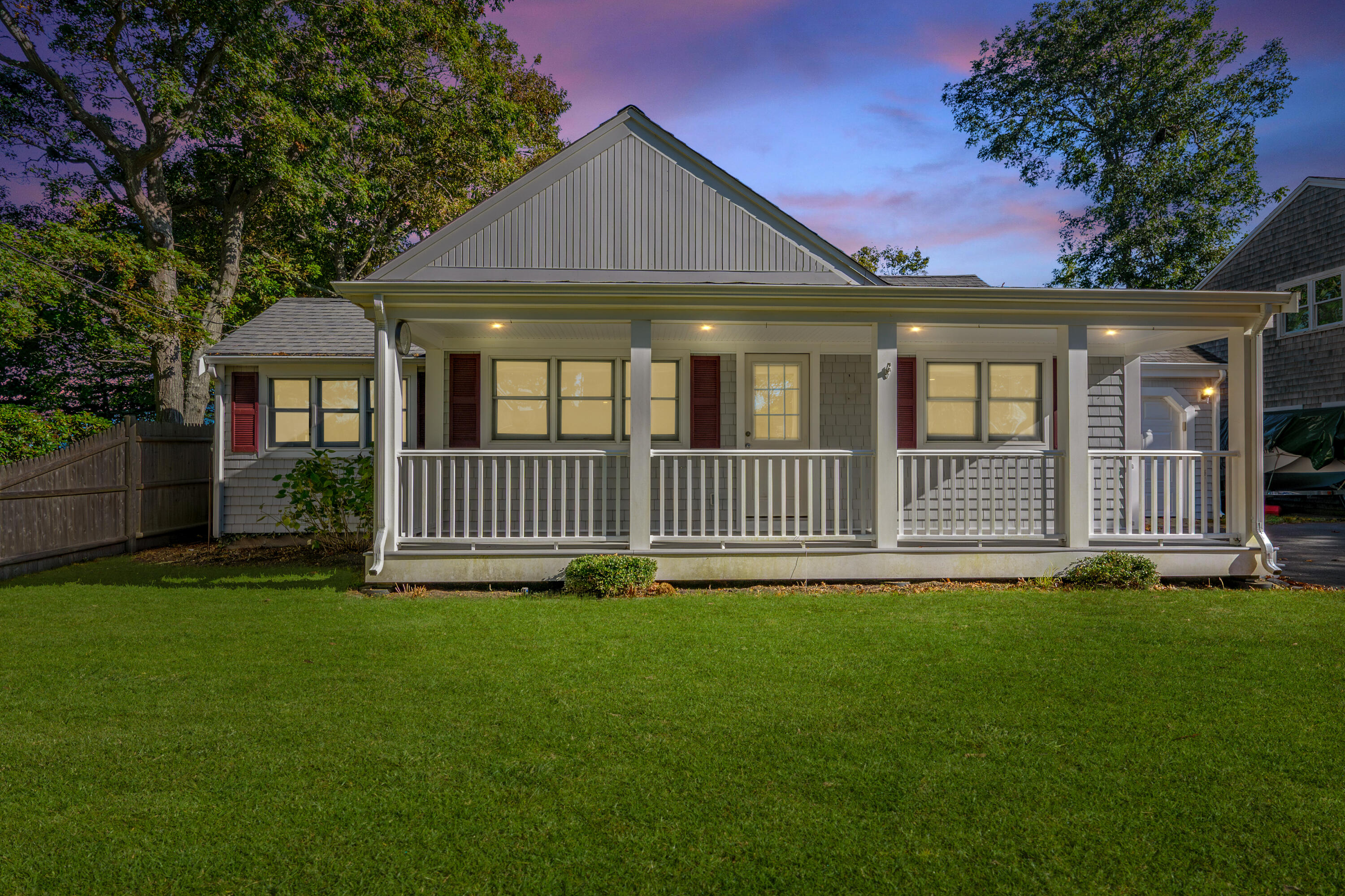 14 Brewster Road West Yarmouth, MA 02673 - Photo 9 of 17 a front view of a house with a garden