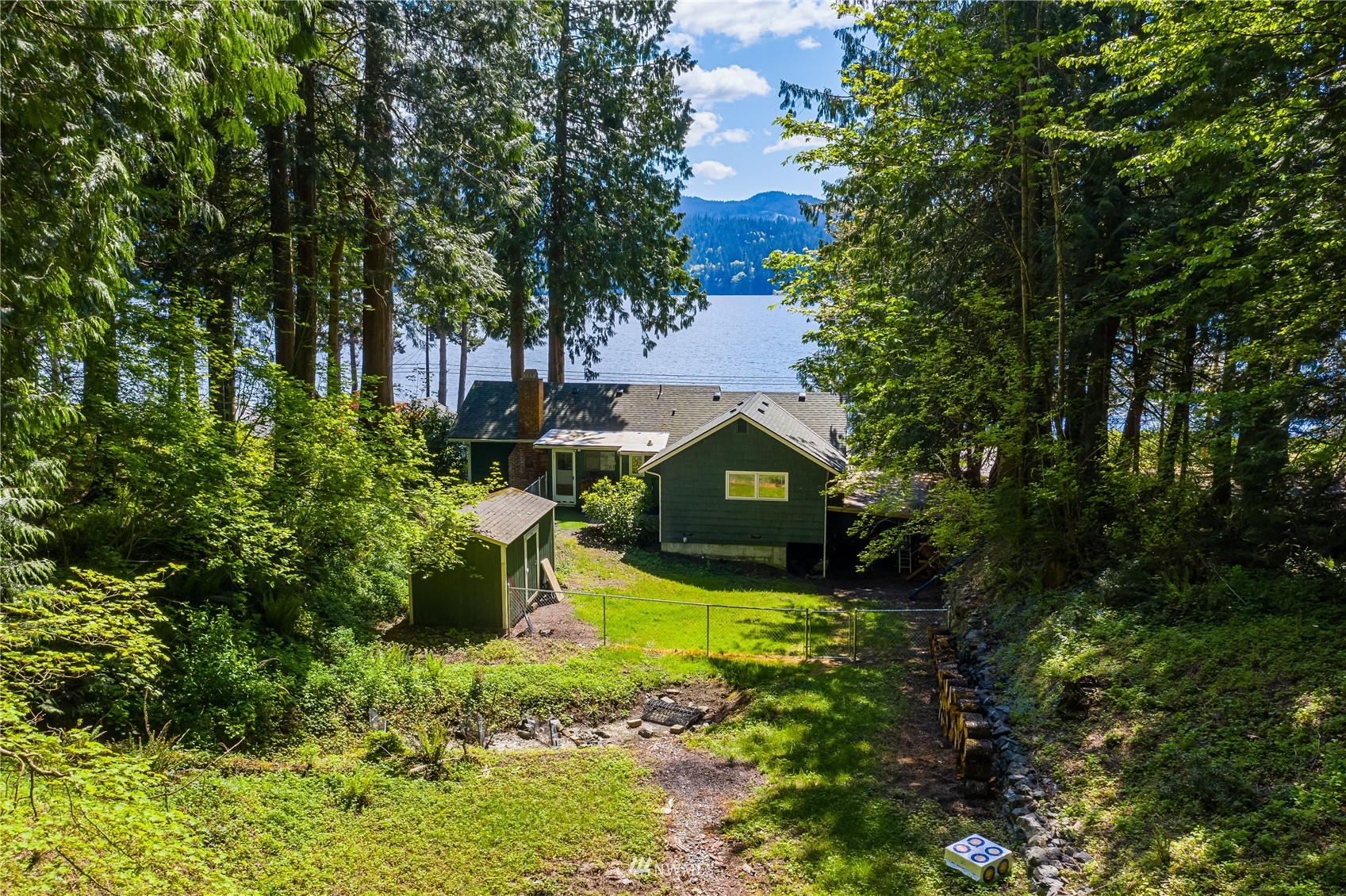 2964 North Shore Road Bellingham, WA 98226 - Photo 11 of 40 a view of a garden with a fountain
