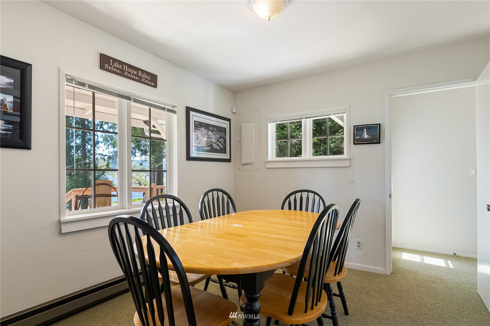 2964 North Shore Road Bellingham, WA 98226 - Photo 20 of 40 a view of a dining room with furniture and windows