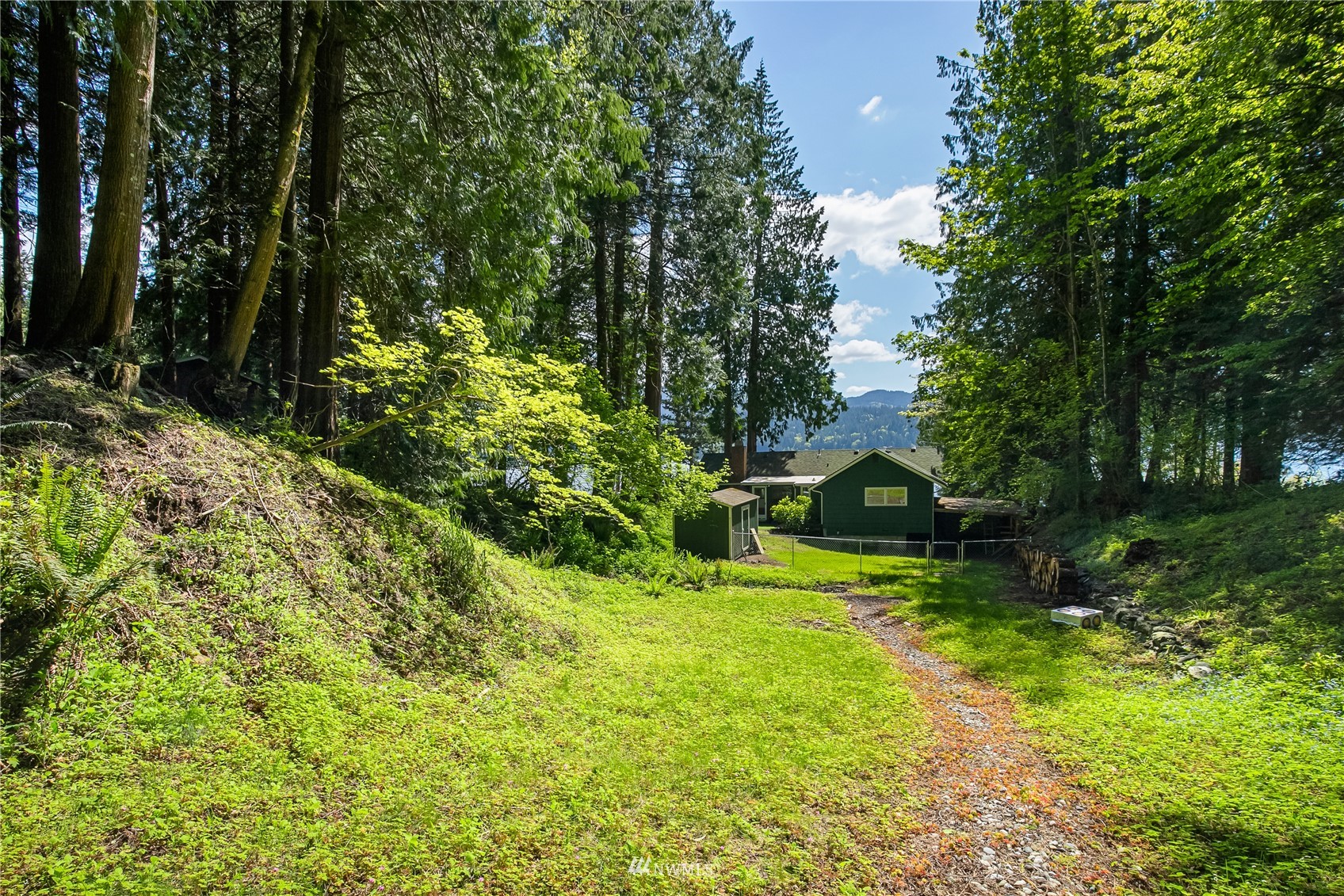 2964 North Shore Road Bellingham, WA 98226 - Photo 34 of 40 a view of a house with a yard