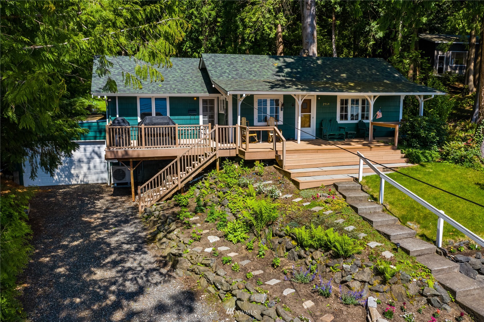 2964 North Shore Road Bellingham, WA 98226 - Photo 37 of 40 a view of a house with pool and wooden fence