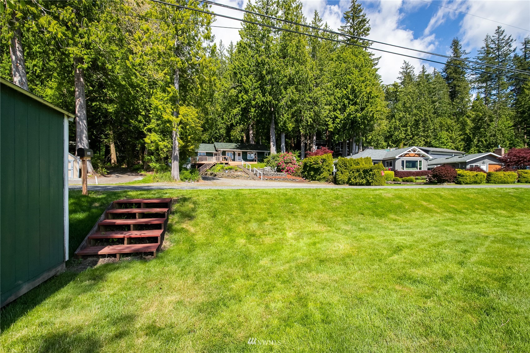 2964 North Shore Road Bellingham, WA 98226 - Photo 6 of 40 a view of a garden with swimming pool
