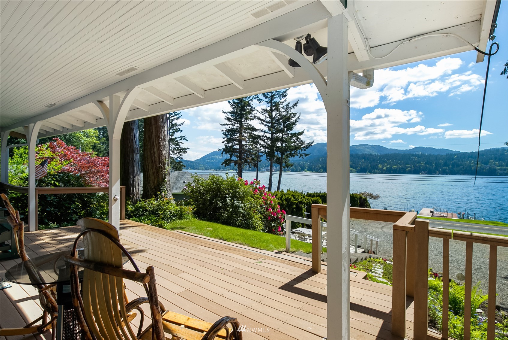 2964 North Shore Road Bellingham, WA 98226 - Photo 9 of 40 a view of a patio with chairs next to a yard