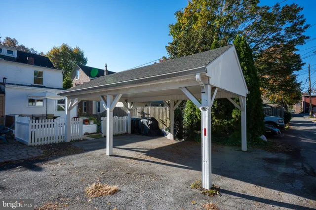 a living room with furniture fireplace and flat screen tv