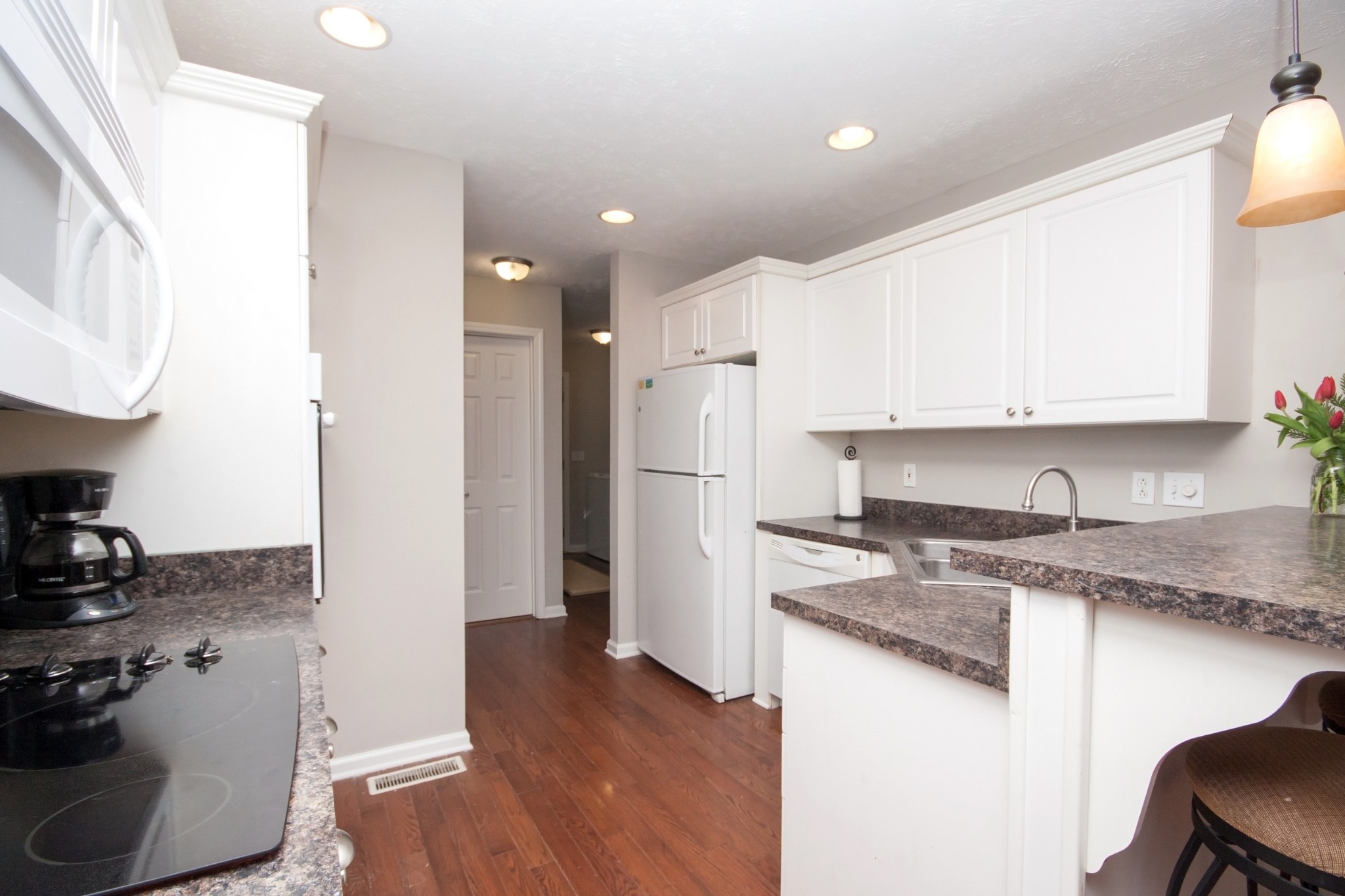 524 Windy Road Mount Juliet, TN 37122 - Photo 13 of 35 a kitchen with a refrigerator and a sink