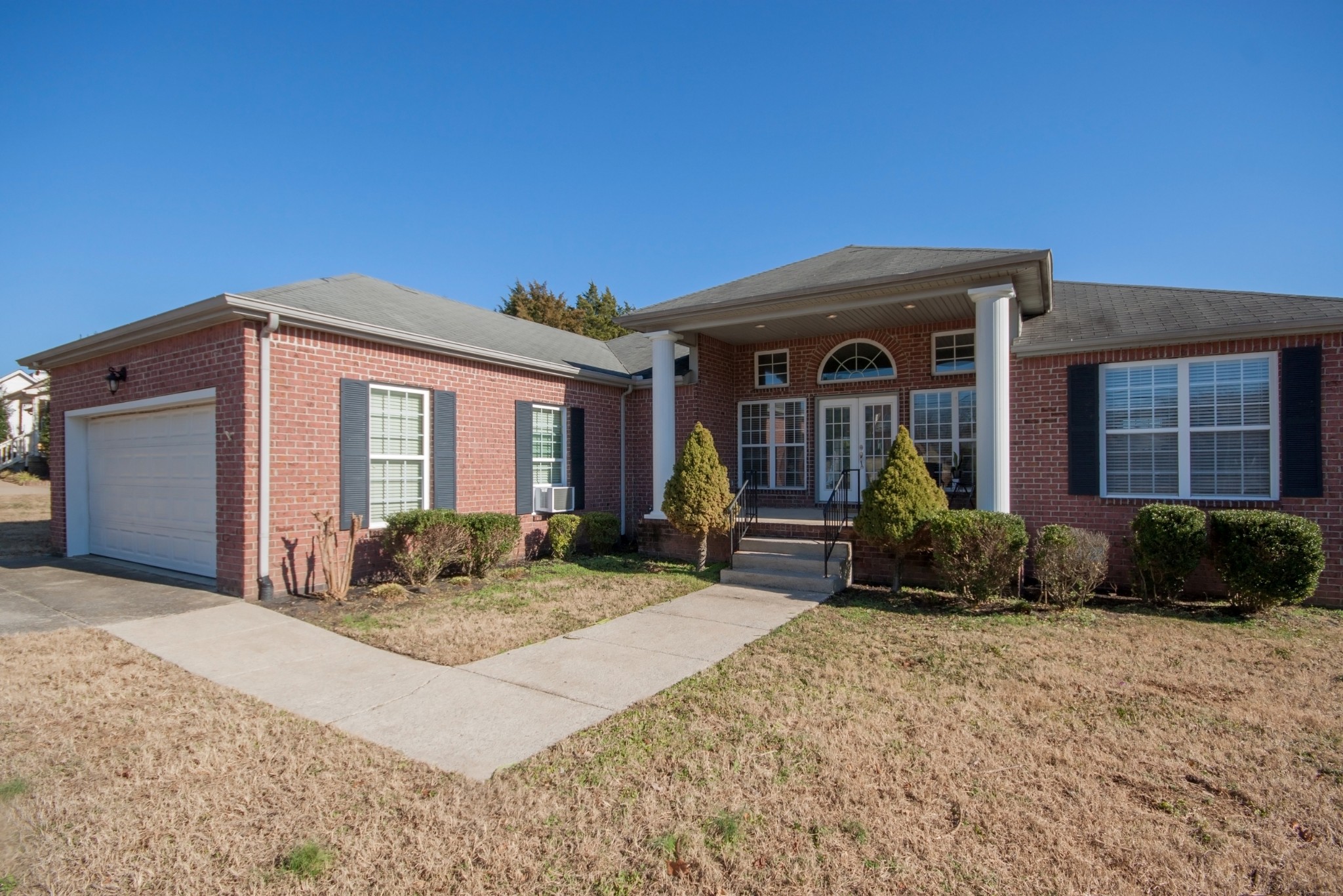524 Windy Road Mount Juliet, TN 37122 - Photo 3 of 35 a front view of a house with garden