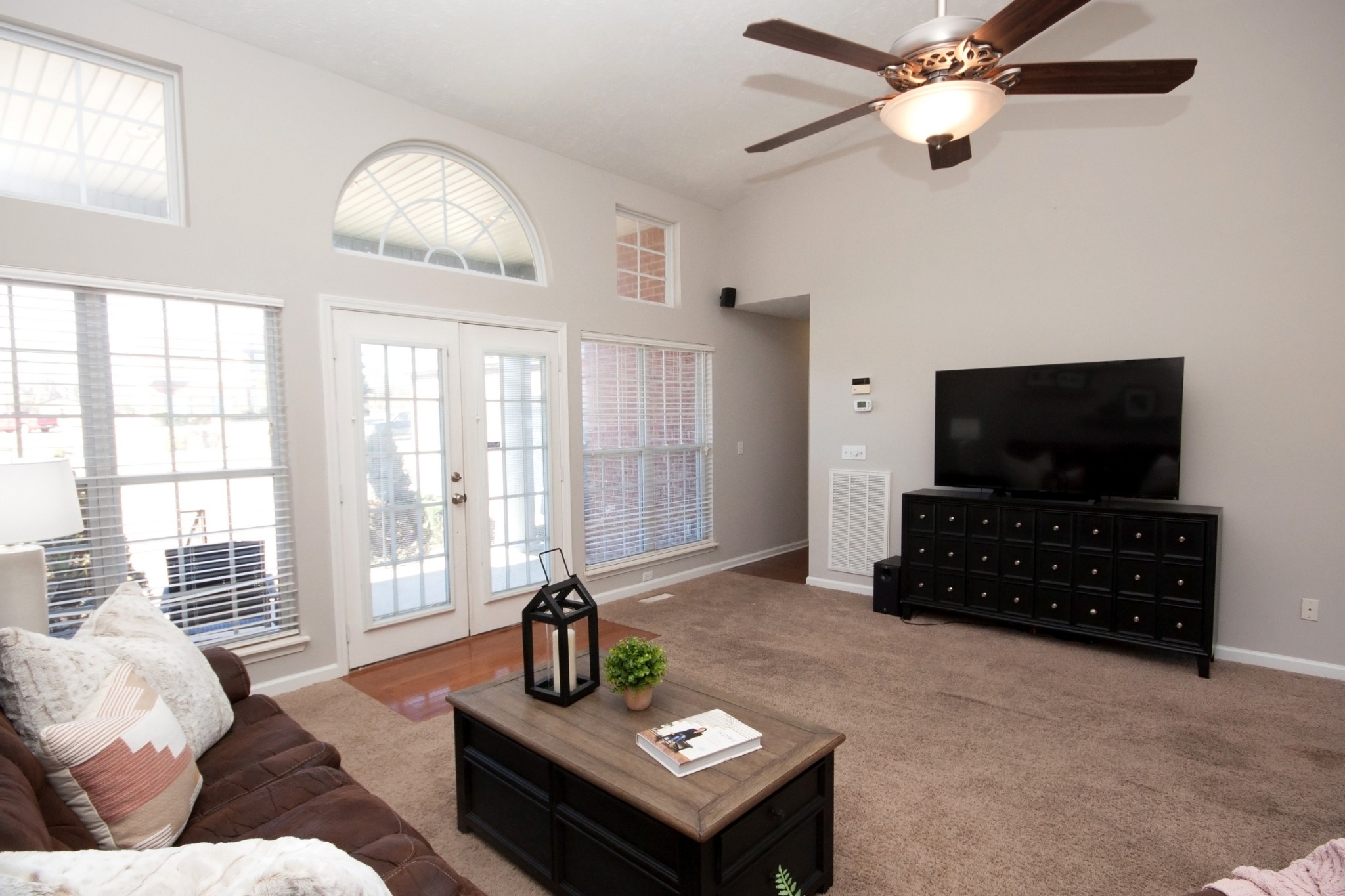 524 Windy Road Mount Juliet, TN 37122 - Photo 6 of 35 a living room with furniture and a flat screen tv