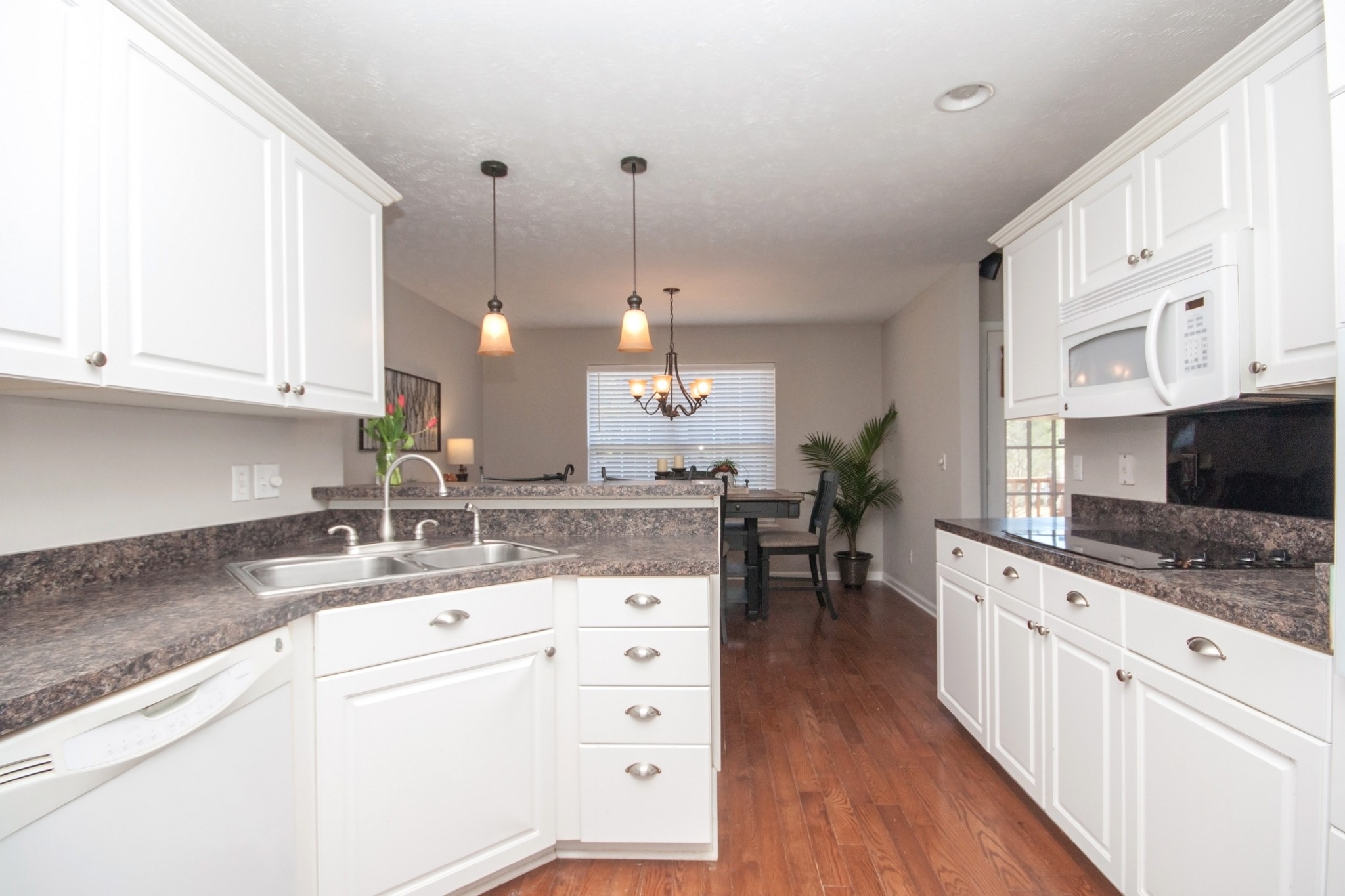 524 Windy Road Mount Juliet, TN 37122 - Photo 9 of 35 a kitchen with granite countertop a sink a counter space appliances and cabinets