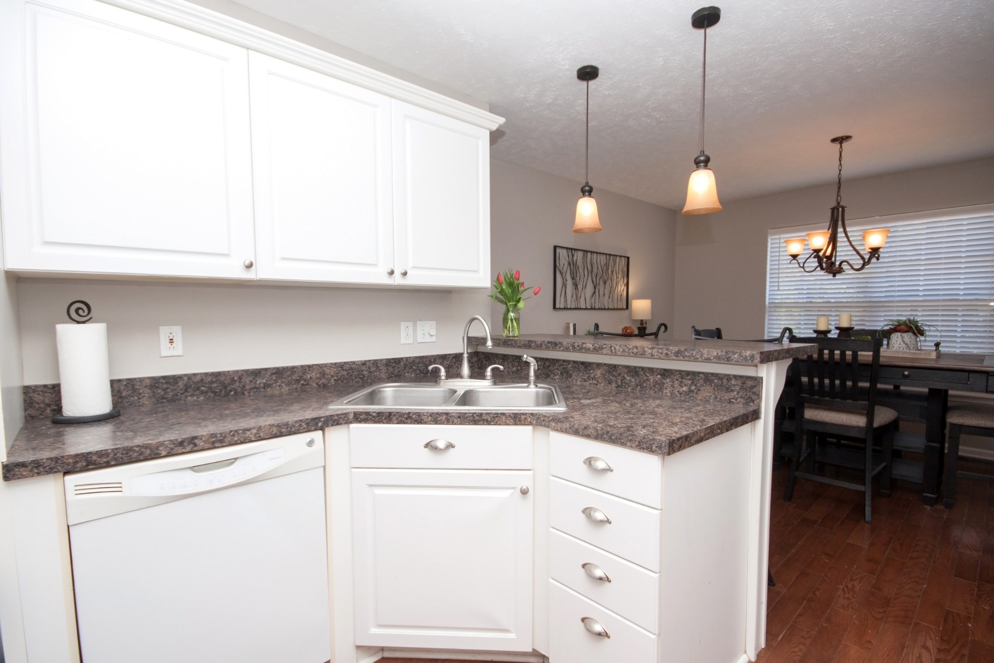 524 Windy Road Mount Juliet, TN 37122 - Photo 10 of 35 a kitchen with stainless steel appliances granite countertop a sink a stove and a wooden floors