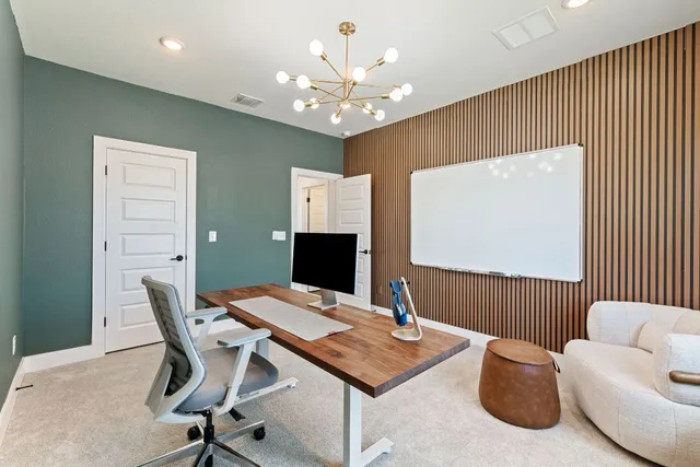 a bathroom with a sink a toilet a mirror a bathtub and shower