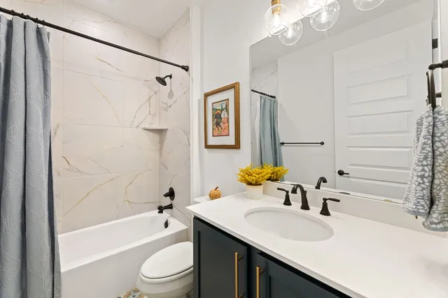 a bedroom with a bed and white walls