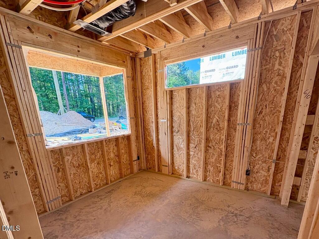 2941 Duke Homestead Road Durham, NC 27705 - Photo 8 of 13 a view of a porch with wooden floor and outdoor space