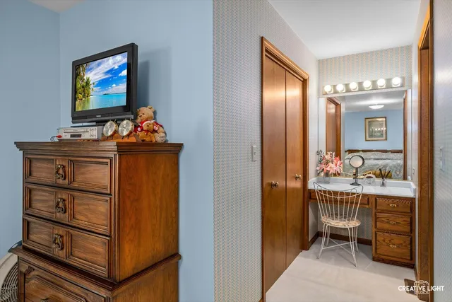 a bathroom with a sink double vanity and a mirror
