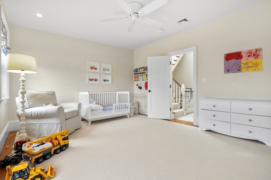 173 Warren Avenue, Unit 2 Boston, MA 02116 - Photo 21 of 32 a living room with furniture and a table
