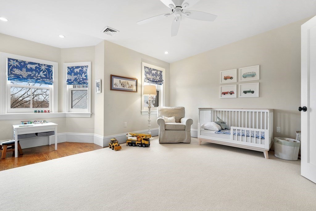 173 Warren Avenue, Unit 2 Boston, MA 02116 - Photo 23 of 32 a bedroom with furniture and a window