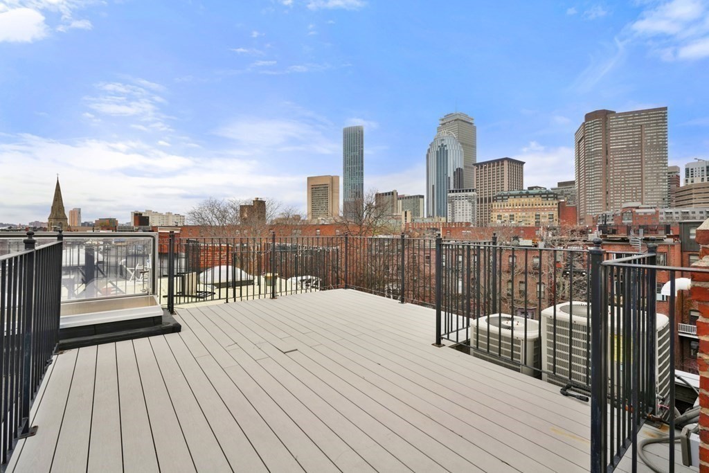 173 Warren Avenue, Unit 2 Boston, MA 02116 - Photo 29 of 32 a view of a balcony with city view