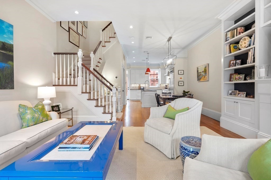173 Warren Avenue, Unit 2 Boston, MA 02116 - Photo 3 of 32 a living room with furniture and wooden floor