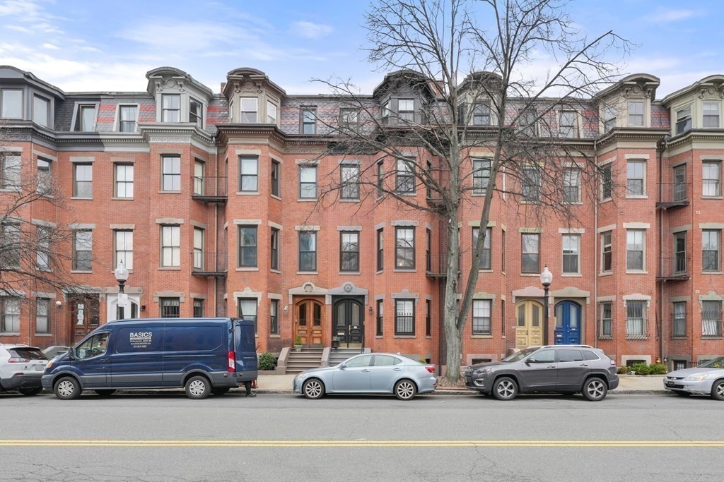173 Warren Avenue, Unit 2 Boston, MA 02116 - Photo 31 of 32 a car parked in front of a building