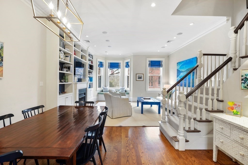 173 Warren Avenue, Unit 2 Boston, MA 02116 - Photo 6 of 32 a dining room with furniture entryway and wooden floor