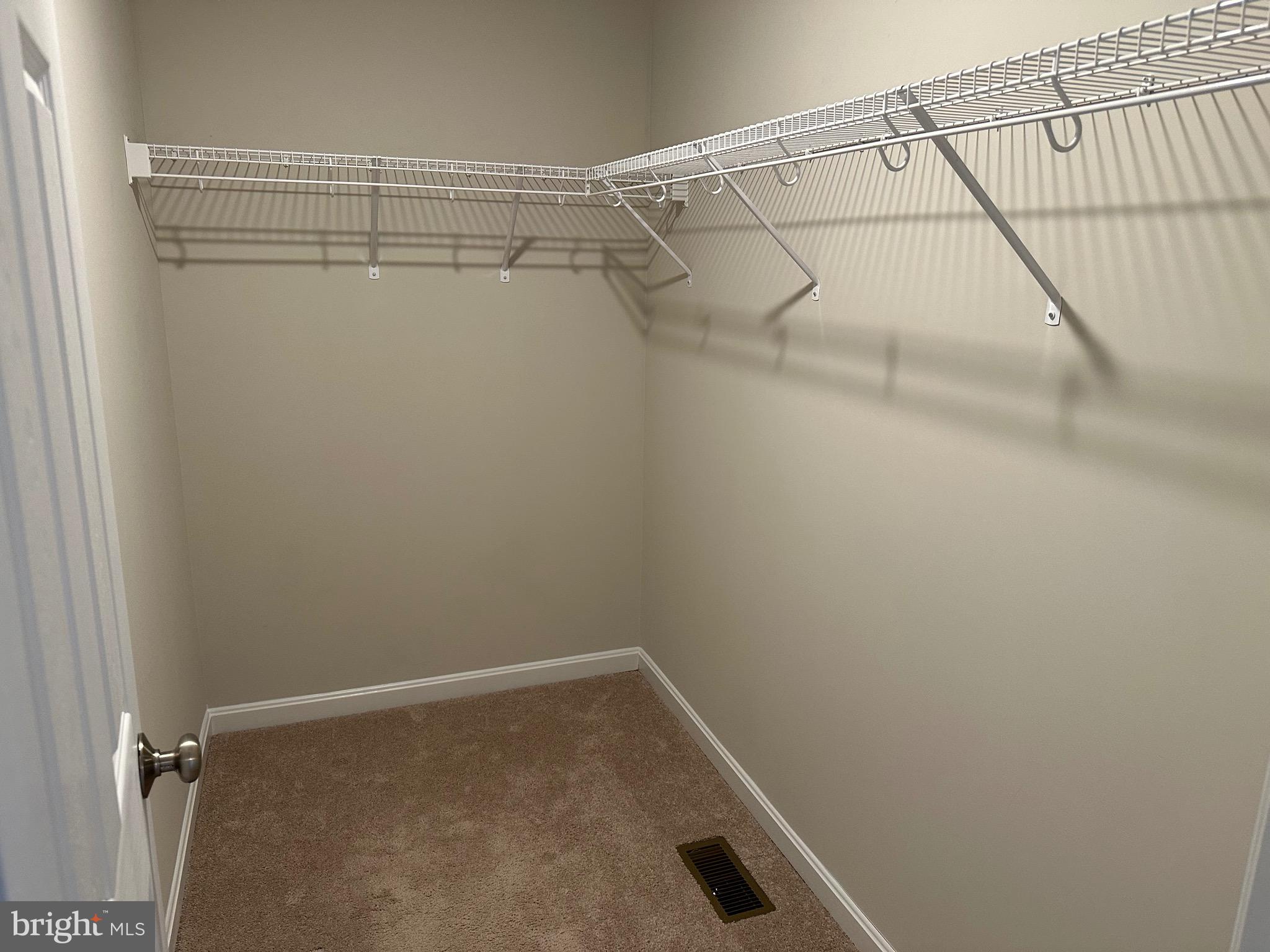 275 Nicholson Drive Colonial Beach, VA 22443 - Photo 12 of 22 a view of a room with racks on the wall