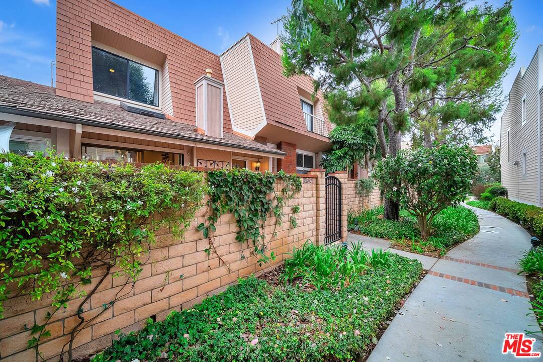 13035 Mindanao Way, Unit 2 Marina del Rey, CA 90292 - Photo 2 of 29 a front view of a house with a yard