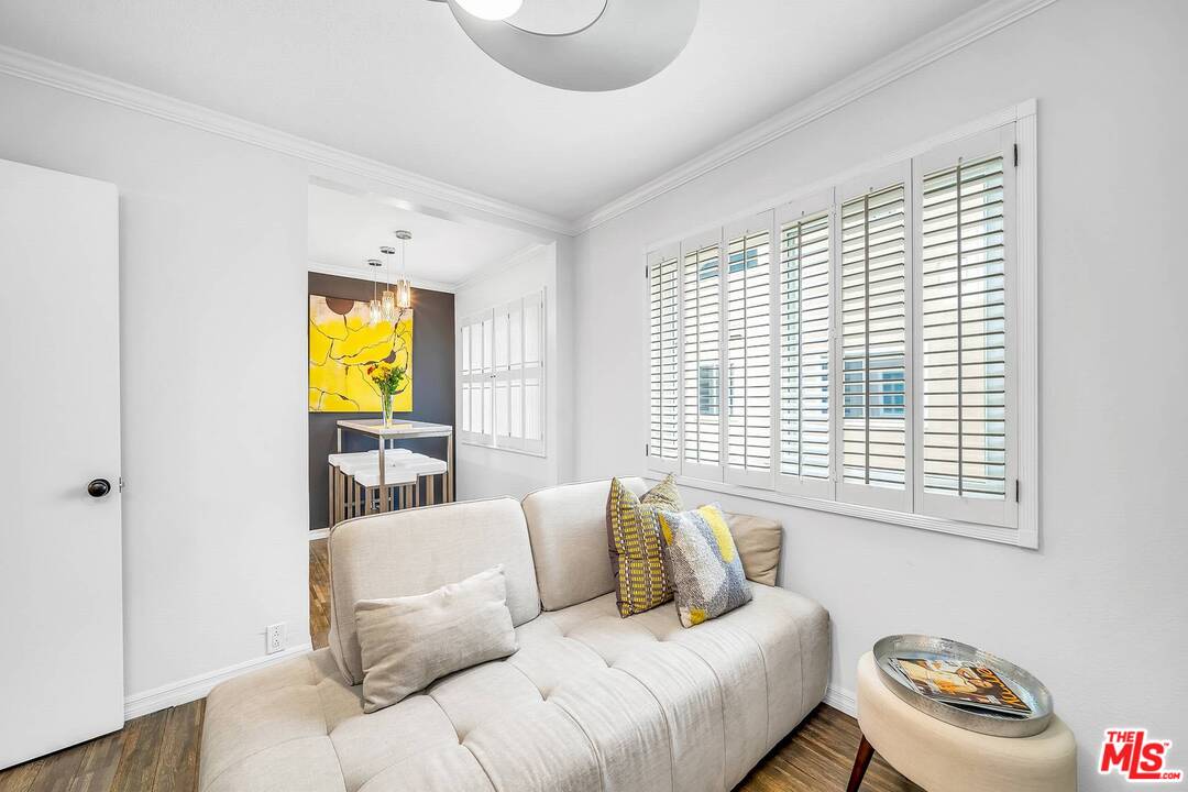 13035 Mindanao Way, Unit 2 Marina del Rey, CA 90292 - Photo 14 of 29 a living room with furniture and a window