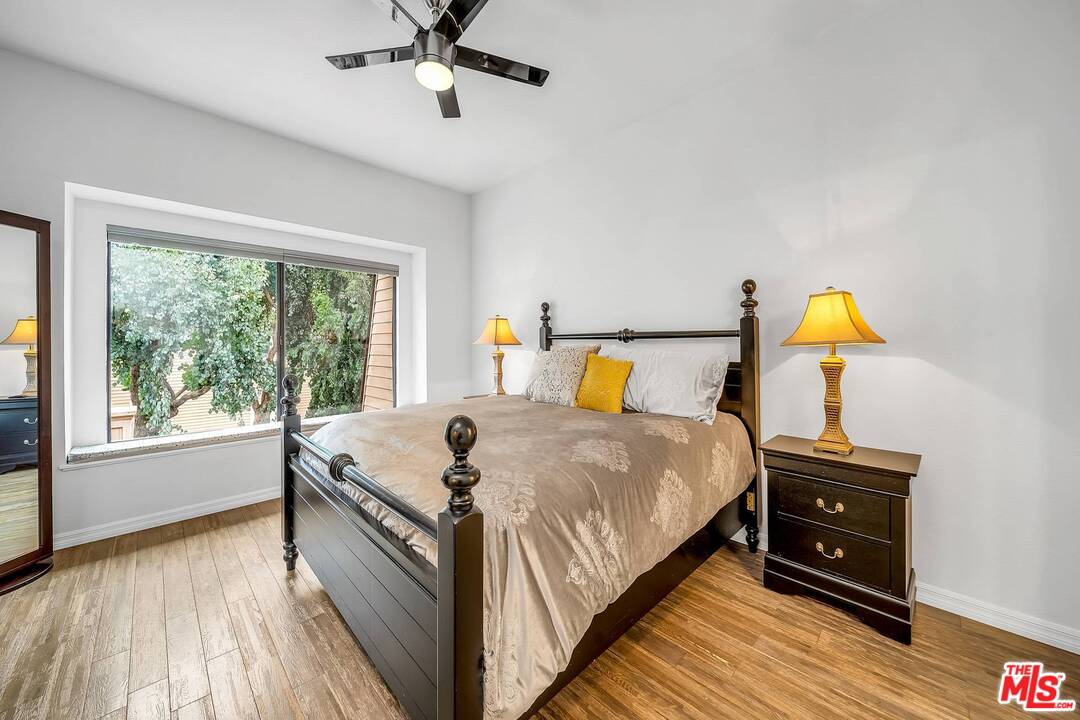 13035 Mindanao Way, Unit 2 Marina del Rey, CA 90292 - Photo 19 of 29 a bed sitting in a bedroom next to a window