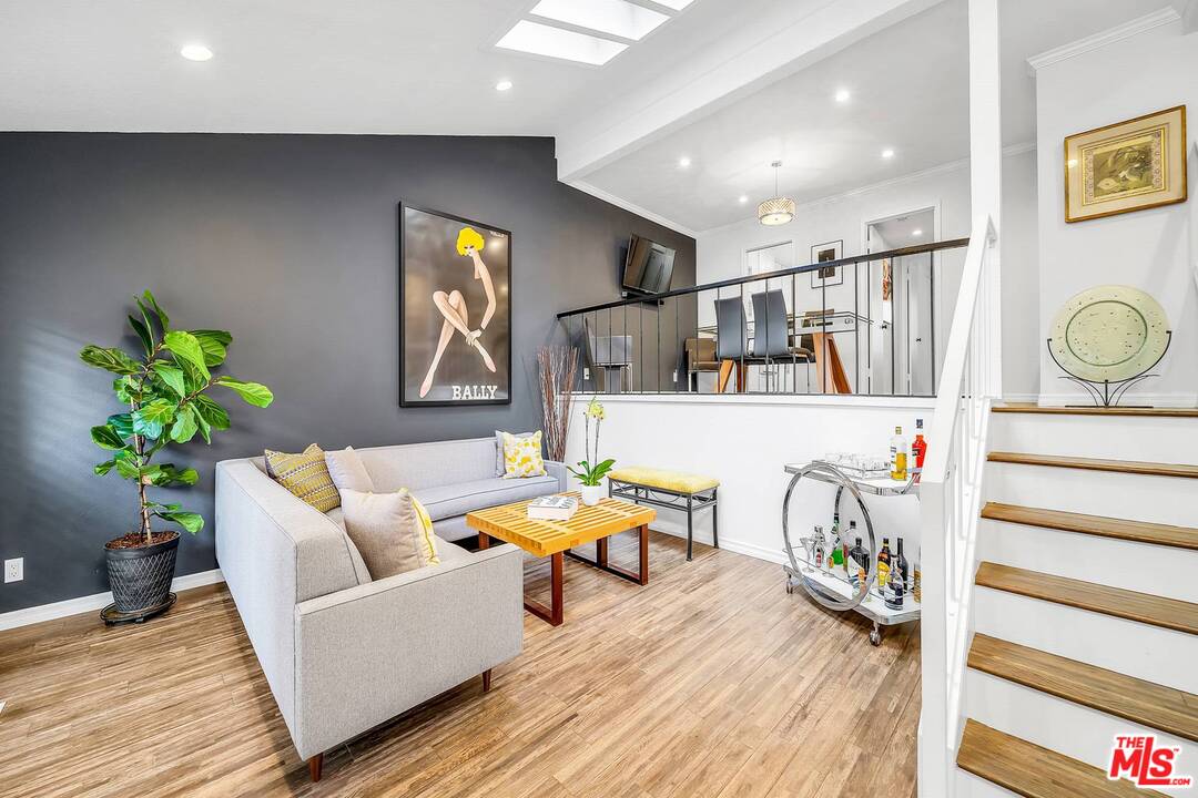13035 Mindanao Way, Unit 2 Marina del Rey, CA 90292 - Photo 4 of 29 a living room with furniture and wooden floor
