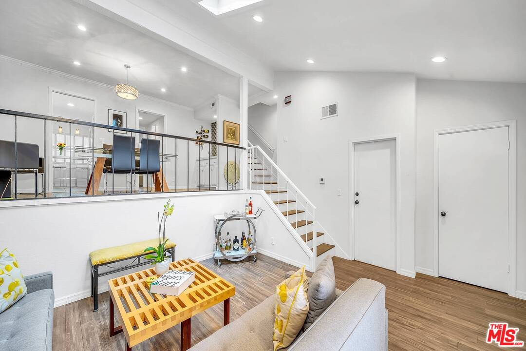 13035 Mindanao Way, Unit 2 Marina del Rey, CA 90292 - Photo 6 of 29 a living room with furniture and wooden floor