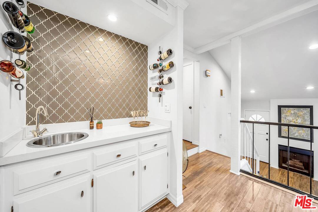 13035 Mindanao Way, Unit 2 Marina del Rey, CA 90292 - Photo 10 of 29 a bathroom with a sink and a mirror