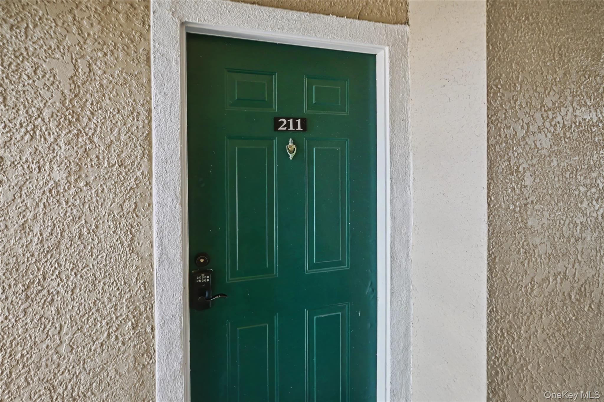 5174 Northridge Road, Unit 211 Sarasota, FL 34238 - Photo 15 of 29 a view of an entryway door