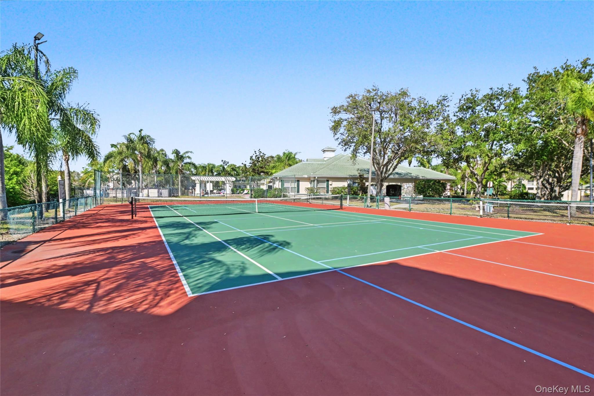 5174 Northridge Road, Unit 211 Sarasota, FL 34238 - Photo 23 of 29 a view of outdoor space with playground and green space