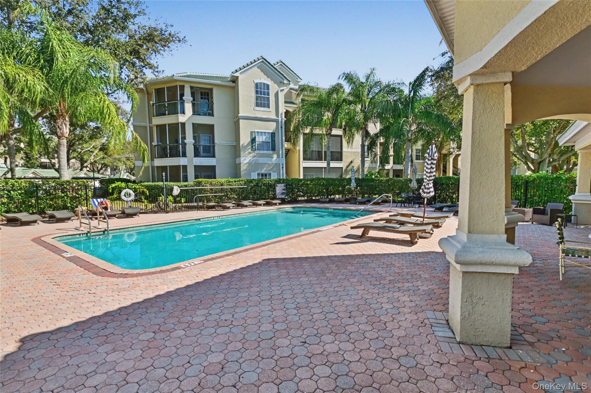 5174 Northridge Road, Unit 211 Sarasota, FL 34238 - Photo 24 of 29 a view of outdoor space yard and swimming pool