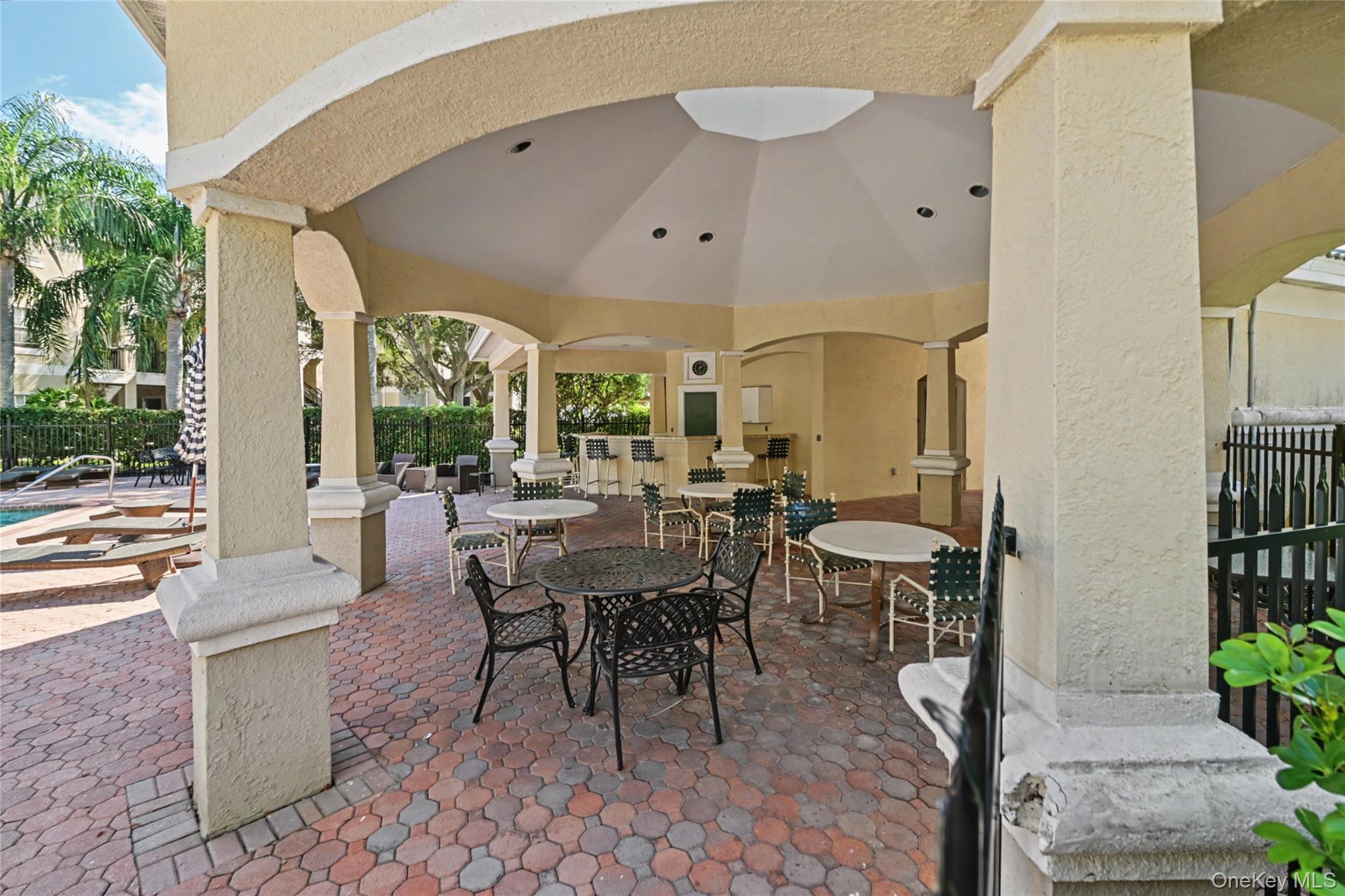 5174 Northridge Road, Unit 211 Sarasota, FL 34238 - Photo 25 of 29 a dining room with furniture and a large window