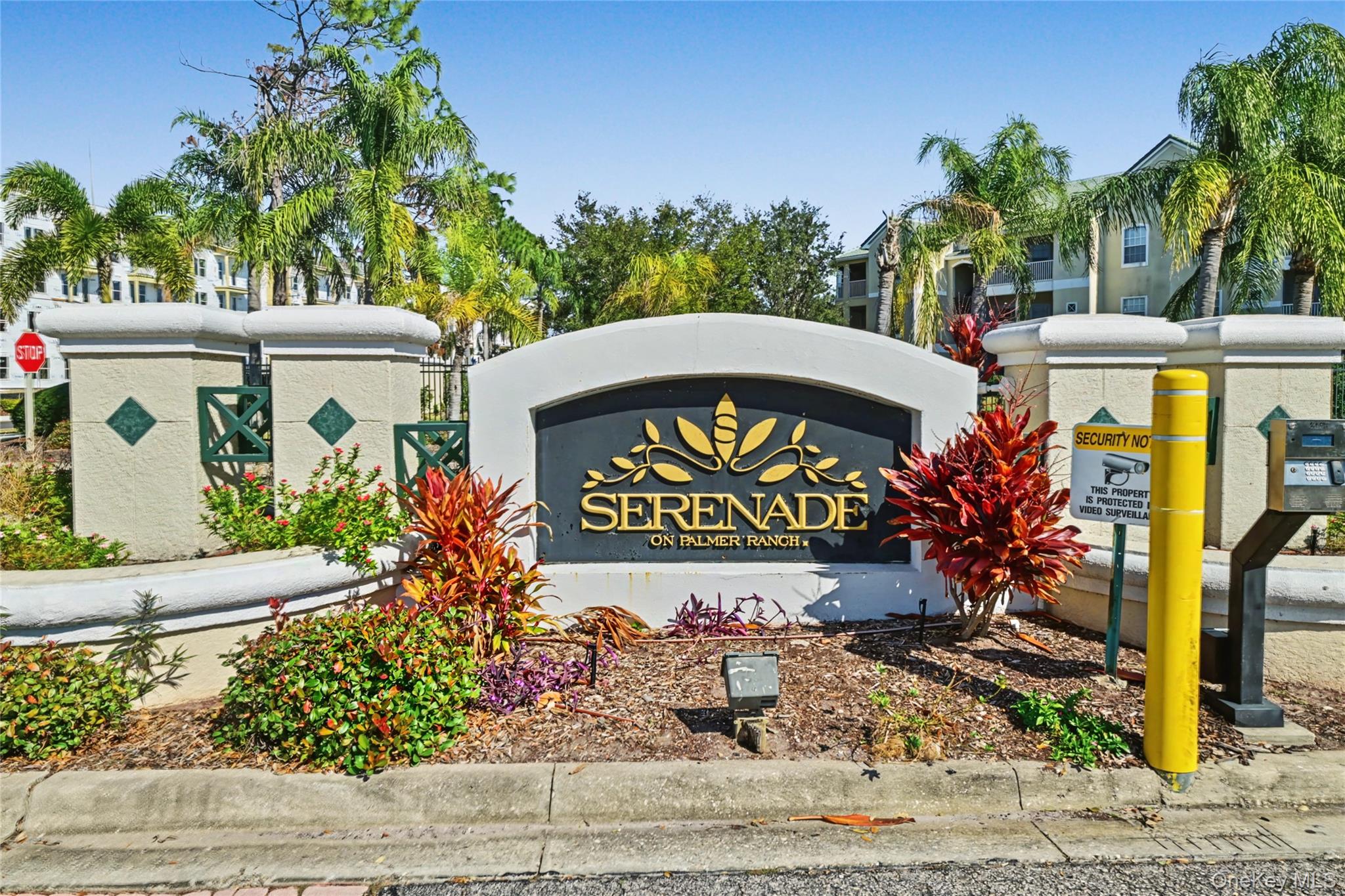 5174 Northridge Road, Unit 211 Sarasota, FL 34238 - Photo 27 of 29 a sign that is next to a road