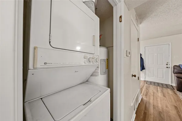 a view of bathroom with a sink and mirror