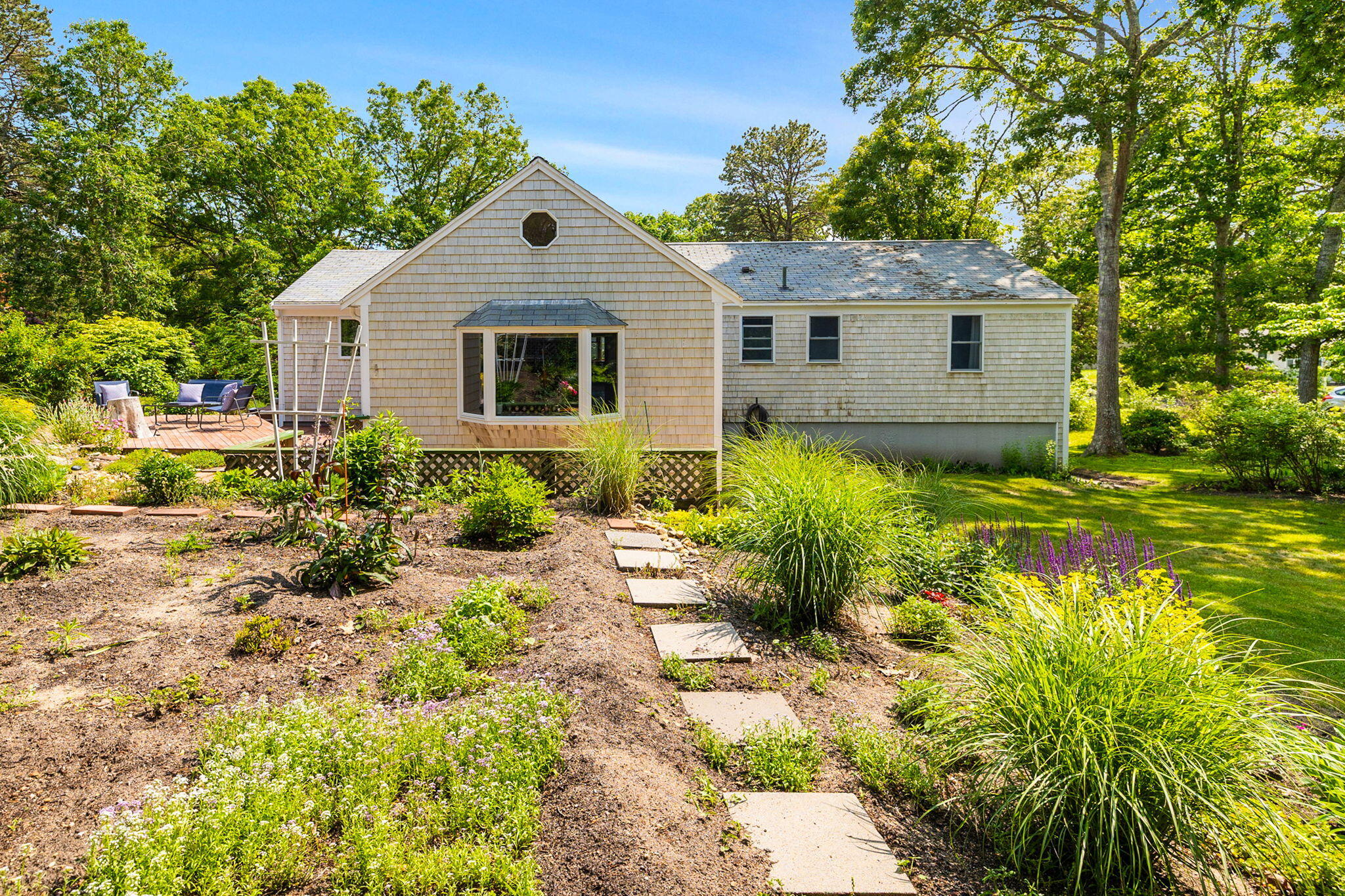 6 Paddock Drive Harwich, MA 02645 - Photo 34 of 40 a front view of house with yard and green space