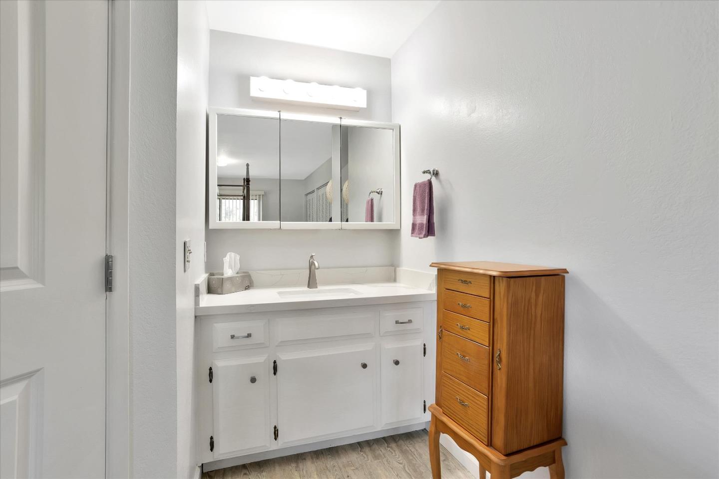 630 Paradise Road Salinas, CA 93907 - Photo 20 of 37 a bathroom with a sink vanity and mirror