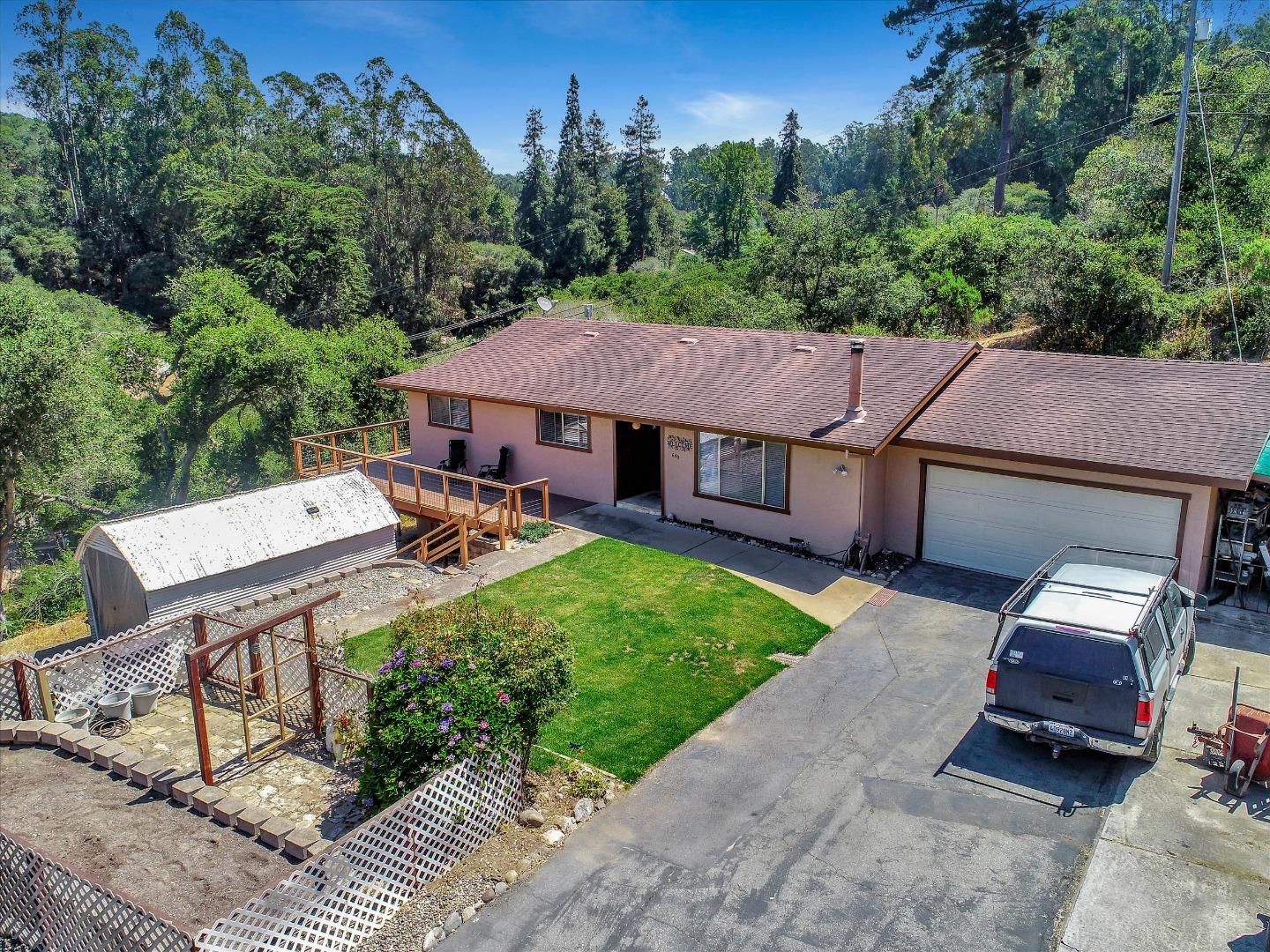630 Paradise Road Salinas, CA 93907 - Photo 2 of 37 a view of a patio with table and chairs with wooden floor and fence
