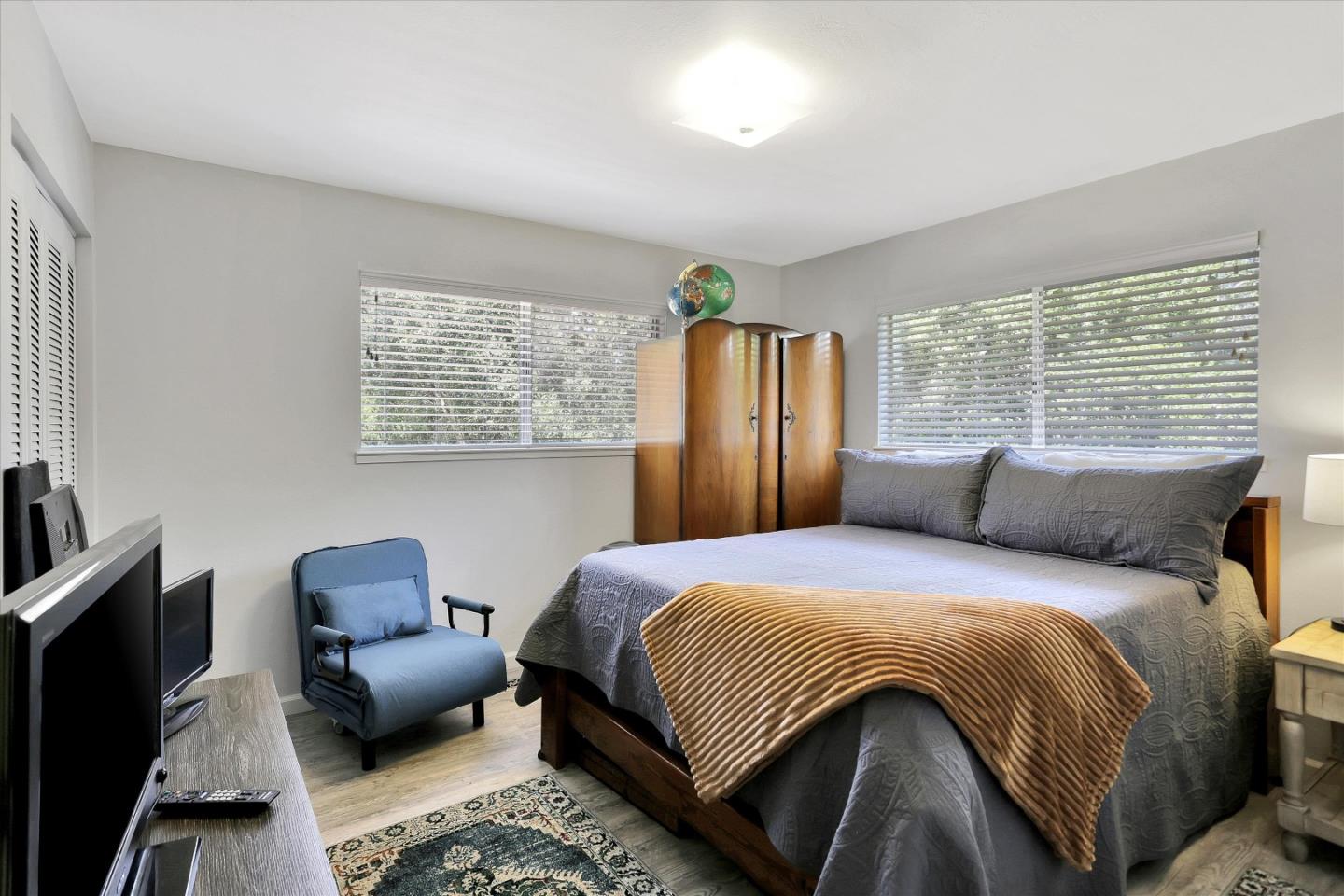 630 Paradise Road Salinas, CA 93907 - Photo 21 of 37 a bedroom with a bed couch and a window