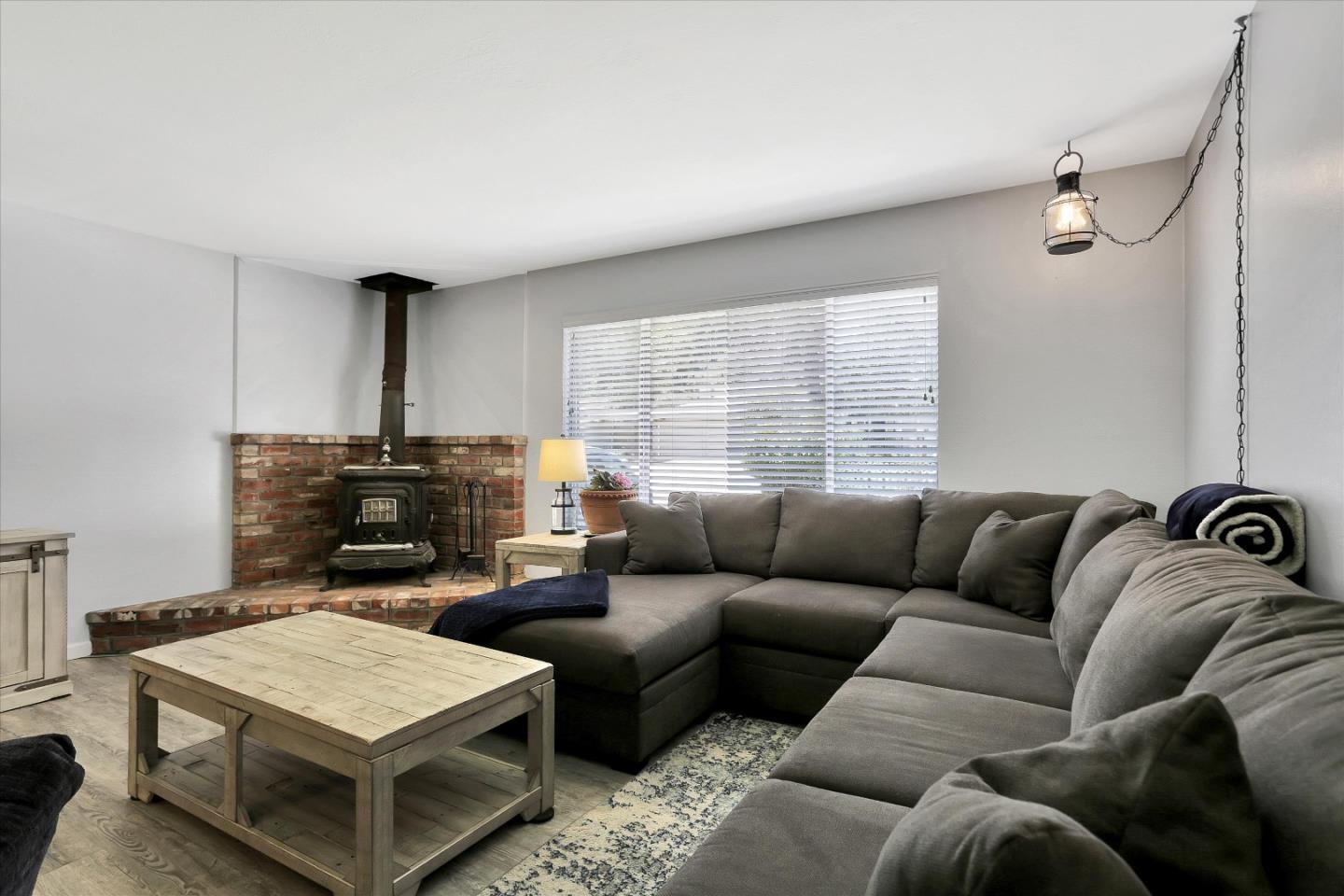 630 Paradise Road Salinas, CA 93907 - Photo 9 of 37 a living room with furniture and a fireplace
