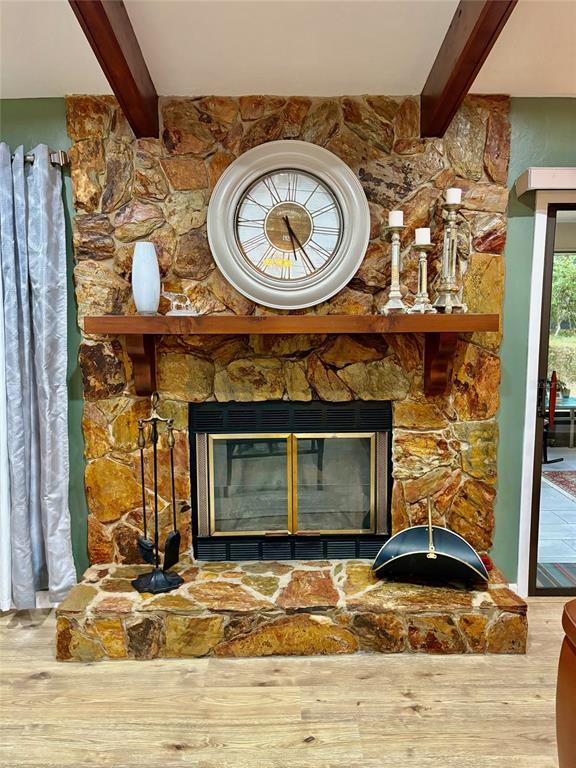 19807 Southwest 85th Loop Dunnellon, FL 34432 - Photo 11 of 60 a view of a fireplace with a table and chairs