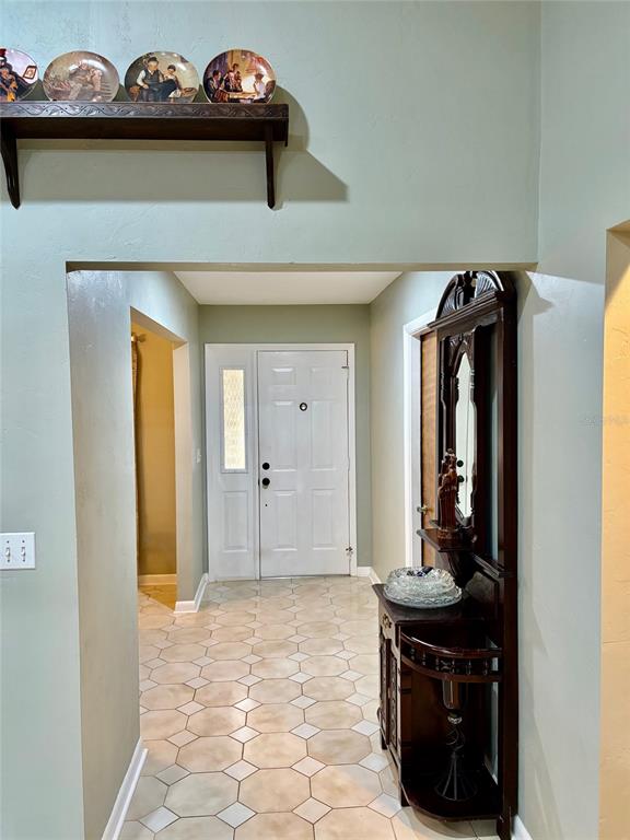 19807 Southwest 85th Loop Dunnellon, FL 34432 - Photo 14 of 60 a view of a hallway with entryway